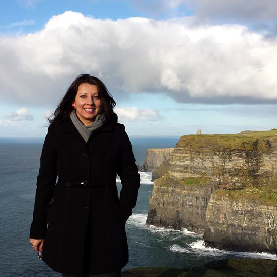 Ausma standing on cliffs, links to Instagram